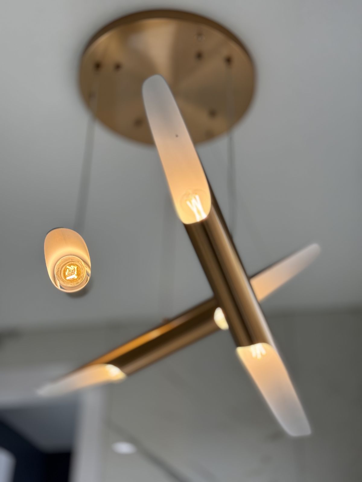 Brass sculptural pendant in a completed Carnaby home