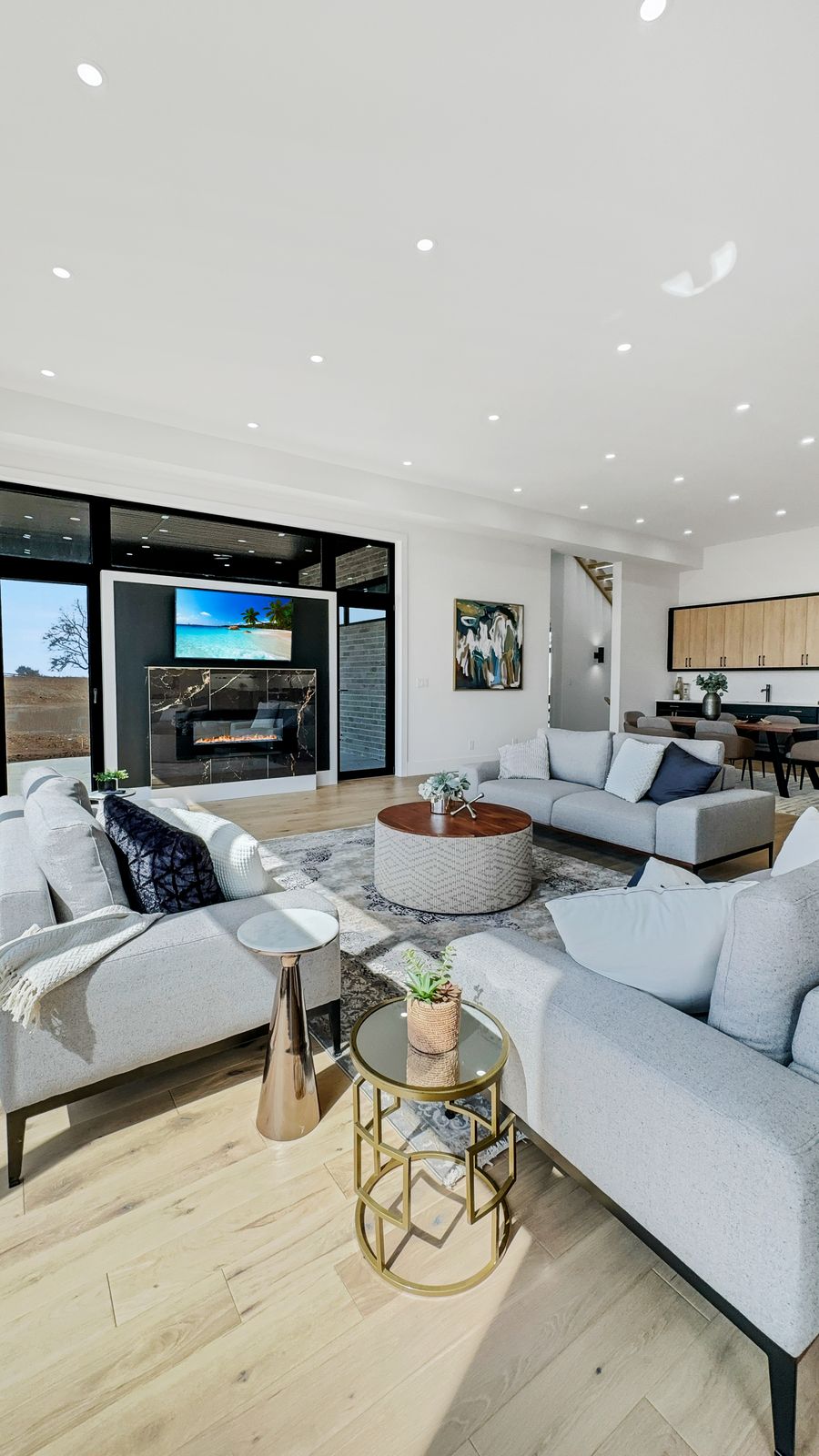 Family room with fireplace in a completed Carnaby home